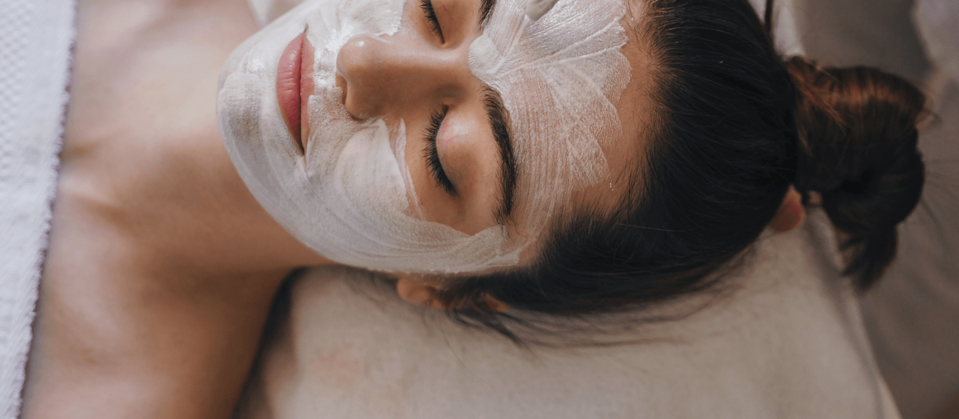 a girl getting a facial